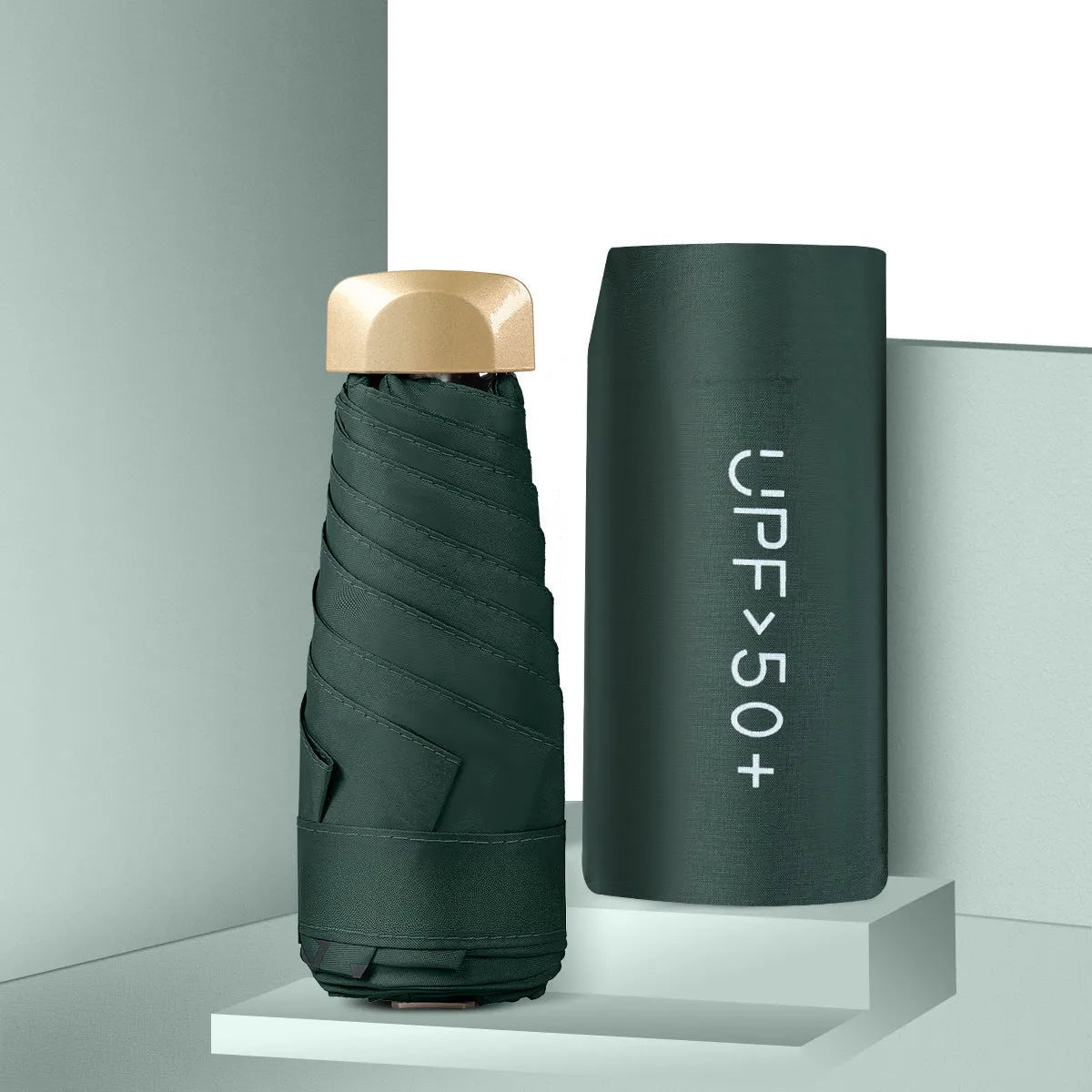 Five-fold mini pocket sun umbrella with rubber handle shown in open position