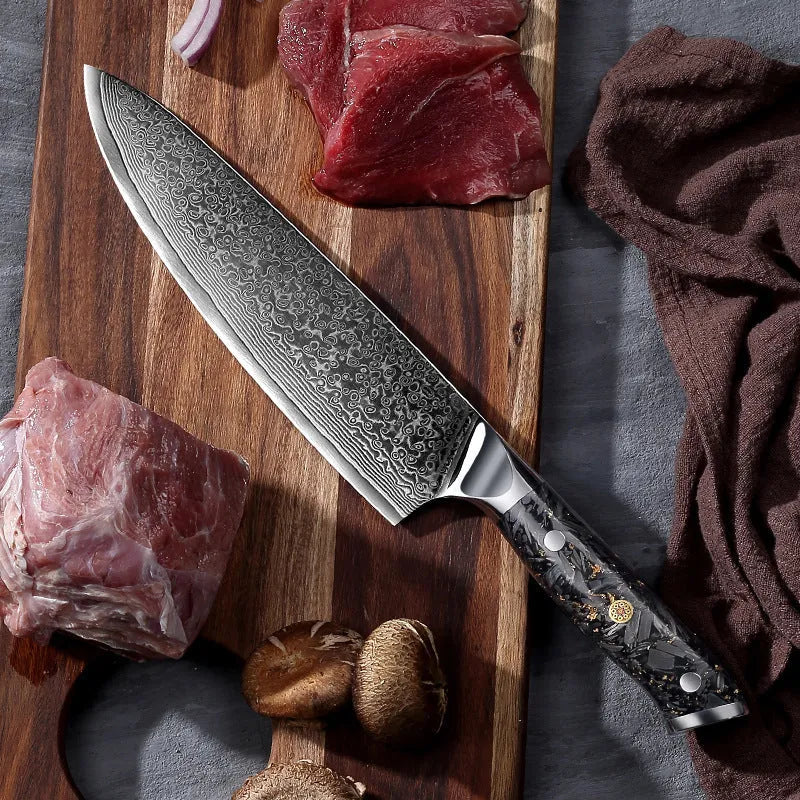 Damascus steel eight-piece kitchen knife set showing fishbone pattern on blades, including fruit, steak, boning, and chef's knives.