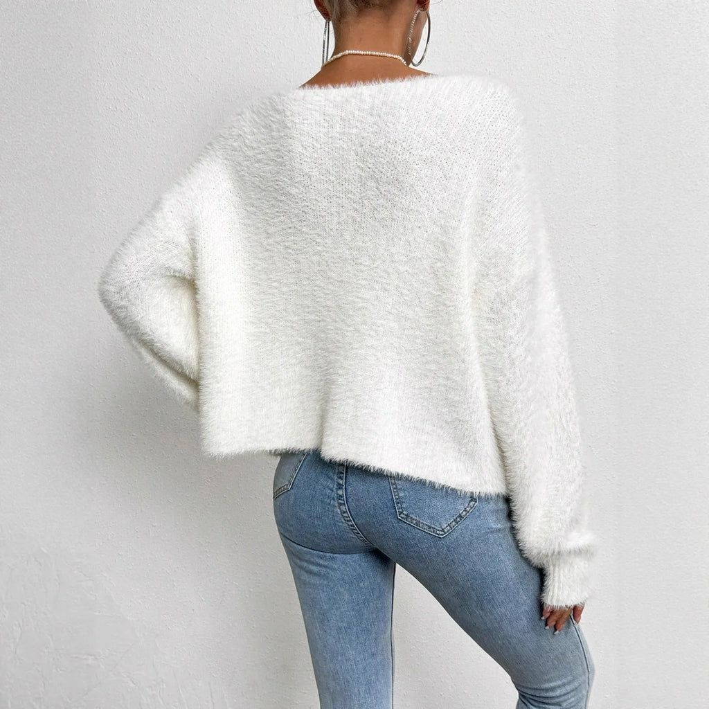 White women's V-neck cardigan with bead details, shown as a knitwear coat.