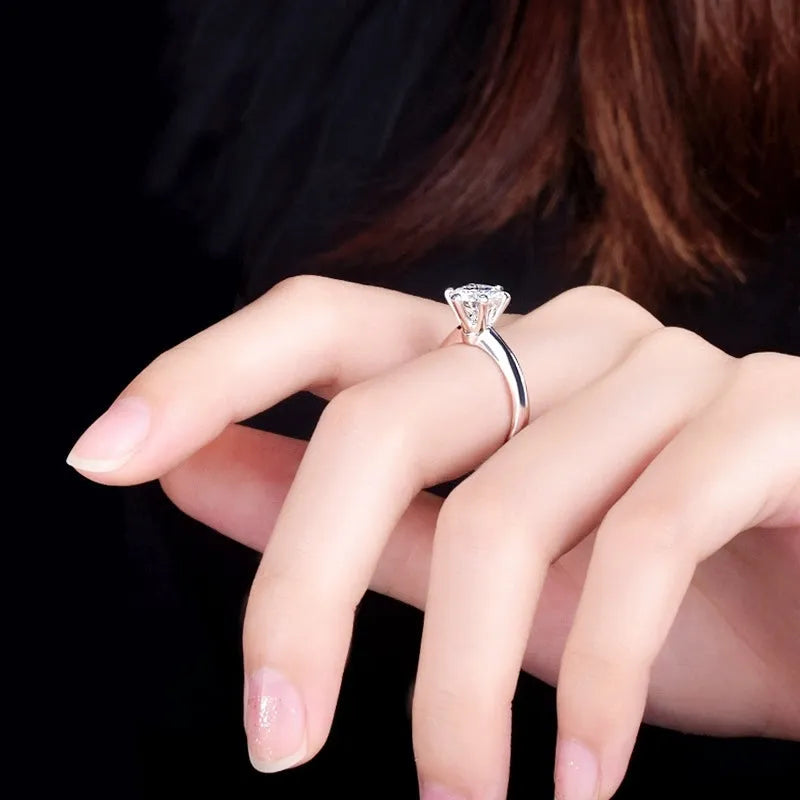 Six-claw inlaid zircon women's ring with geometric design in white gold plated finish