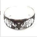 Ethnic Miao silver carved open bracelet with Roman shape design in alloy construction