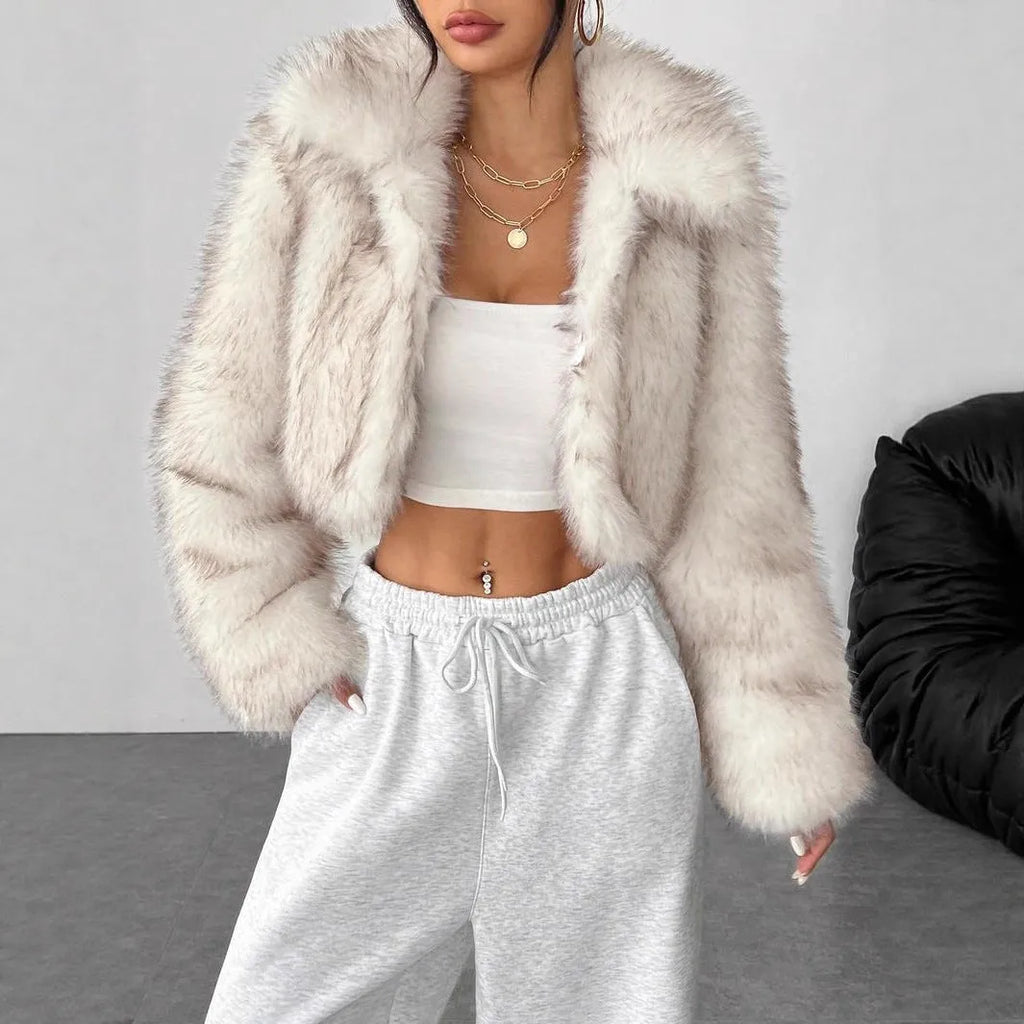 Artificial fur coat with fur collar in short 40cm length showing black tip on black colour variation