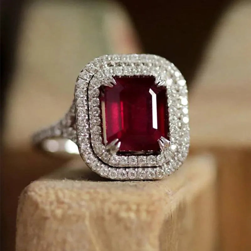 Copper square princess ring with red rhinestones, shown in size selection.