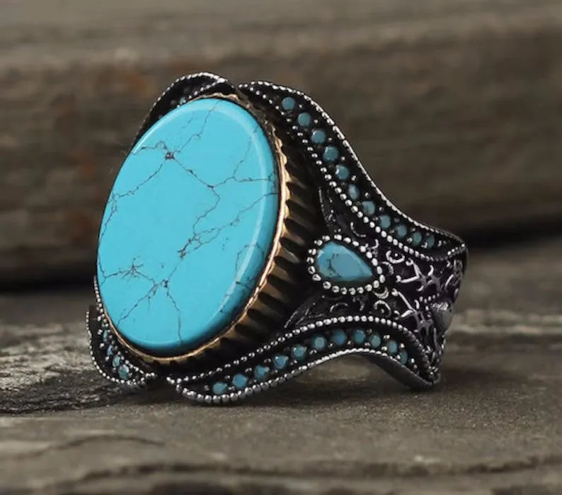 Men's antique silver turquoise alloy ring showing round band design