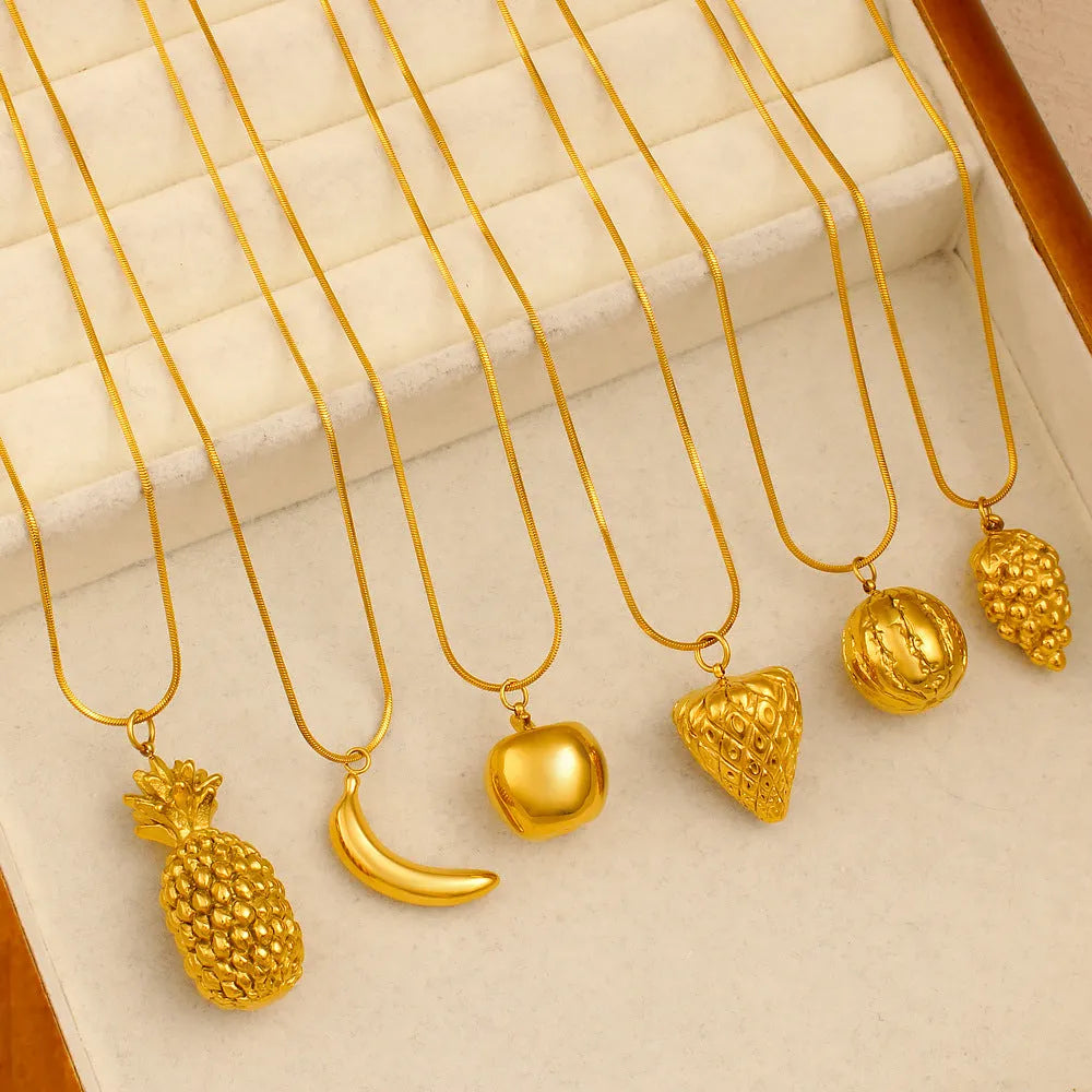 Women's stainless steel fruit necklace with apple, grape, watermelon, pineapple, strawberry, banana pendant designs on regular chain.