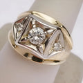 Geometric hollow couple ring in gold-coloured copper with square pattern, shown on finger.
