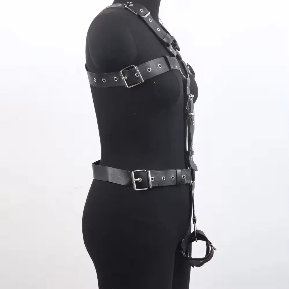 Thin black patent leather shapewear belt with a silver-tone pin buckle on a mannequin waist.