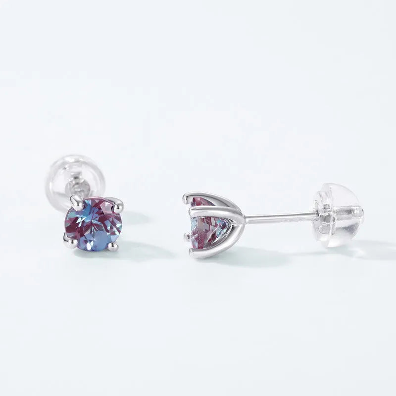 Geometric round silver ear studs with cultivated Alexandrite stone centre
