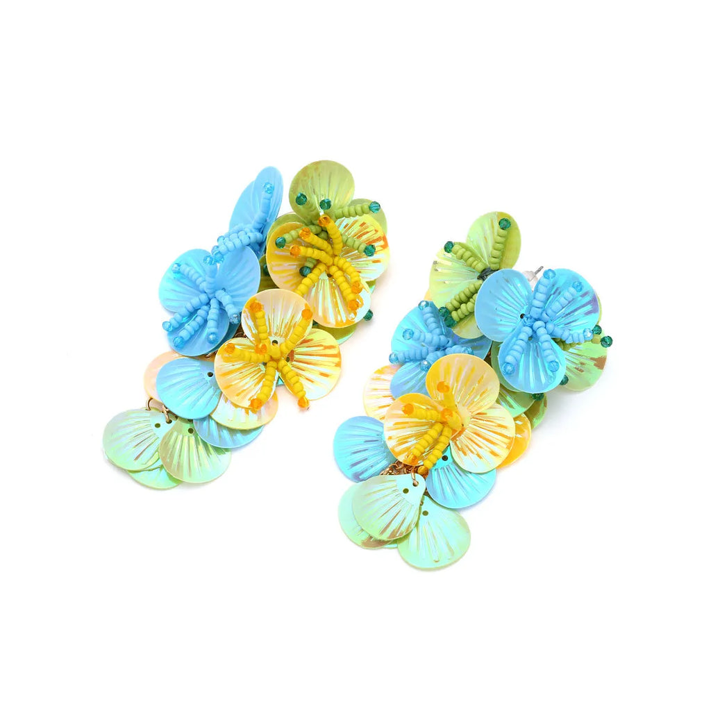 Handmade colourful string bead flower earrings with exaggerated floral leaf design in dopamine style.