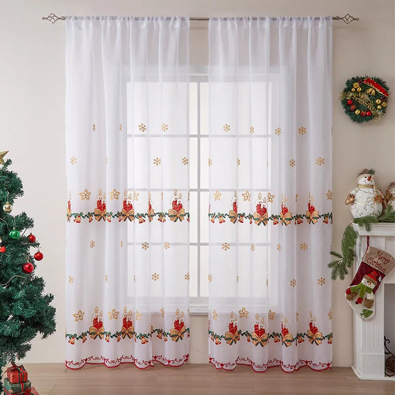 Christmas curtains with white snowflake embroidery on red polyester fabric hanging in window