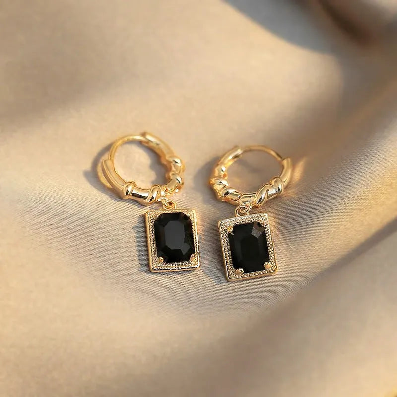 Black geometric quadrilateral zircon earrings with French court retro styling in copper construction