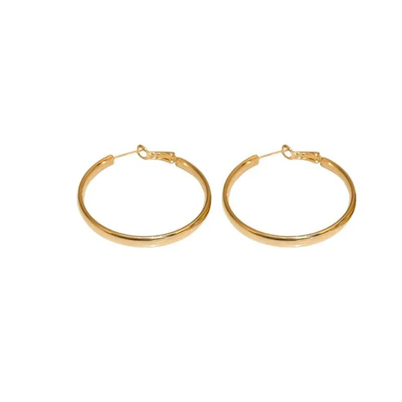 40mm circular metal earrings with electroplated gold or silver finish on copper base