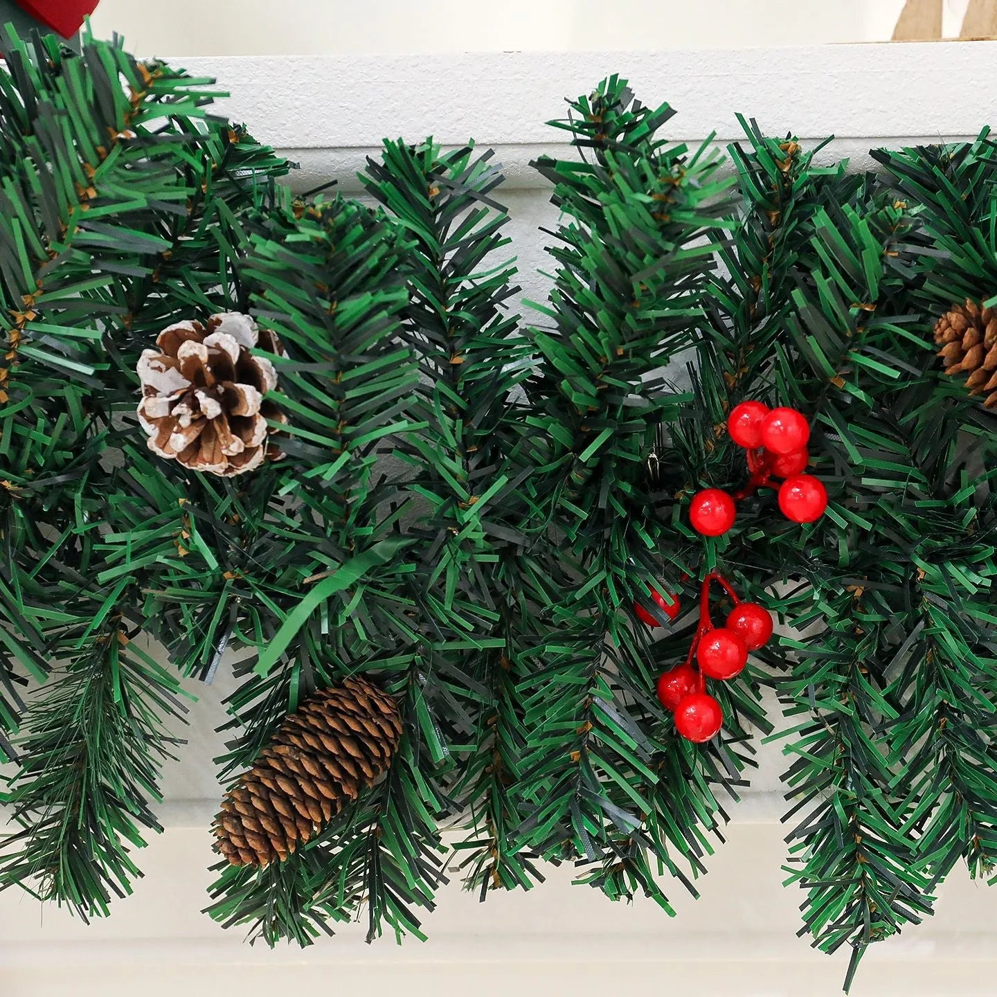 European style PVC Christmas cane decoration with rattan design, pine cones and decorative bow