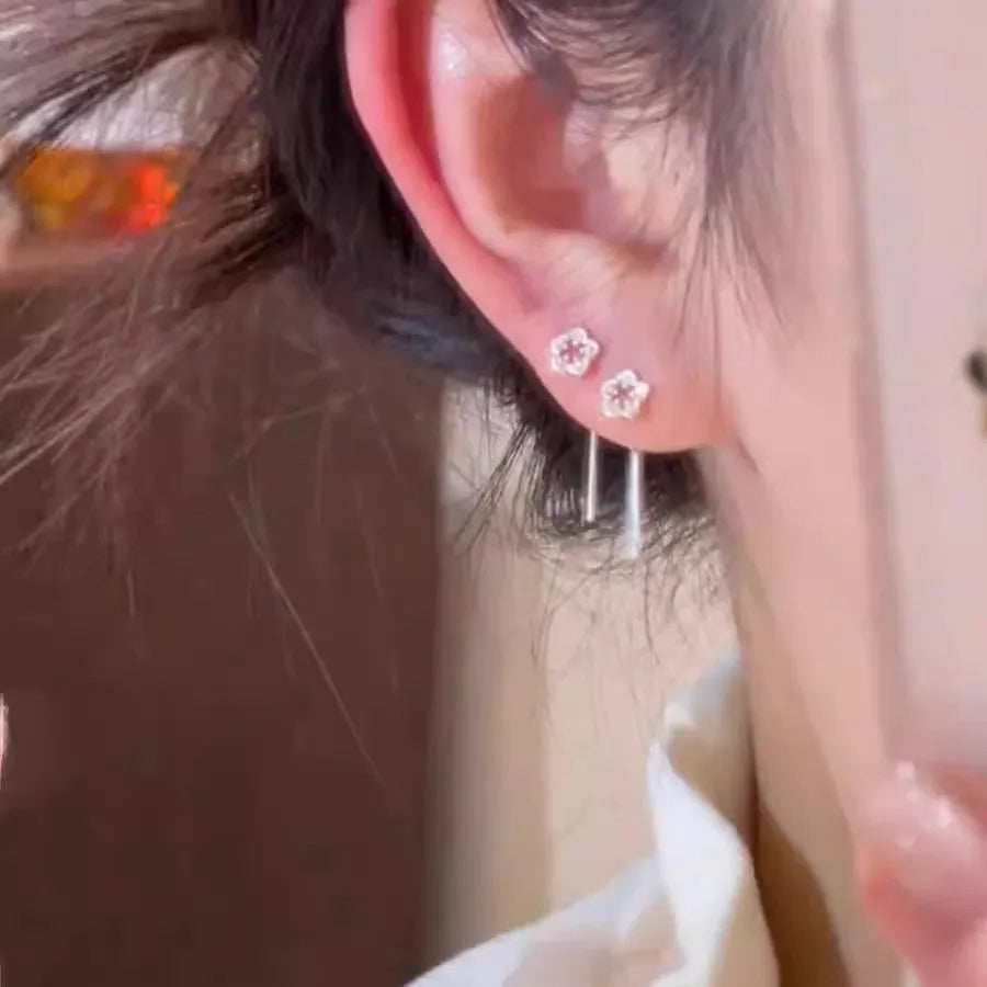 Silver colour hollow floral drop earrings with natural petal design and flower studs