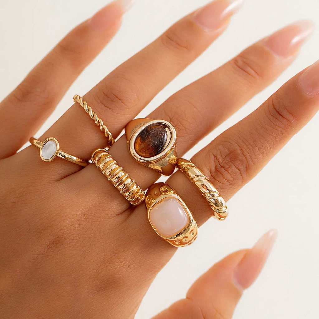 Light gold geometric ring set with six irregular alloy rings electroplated finish
