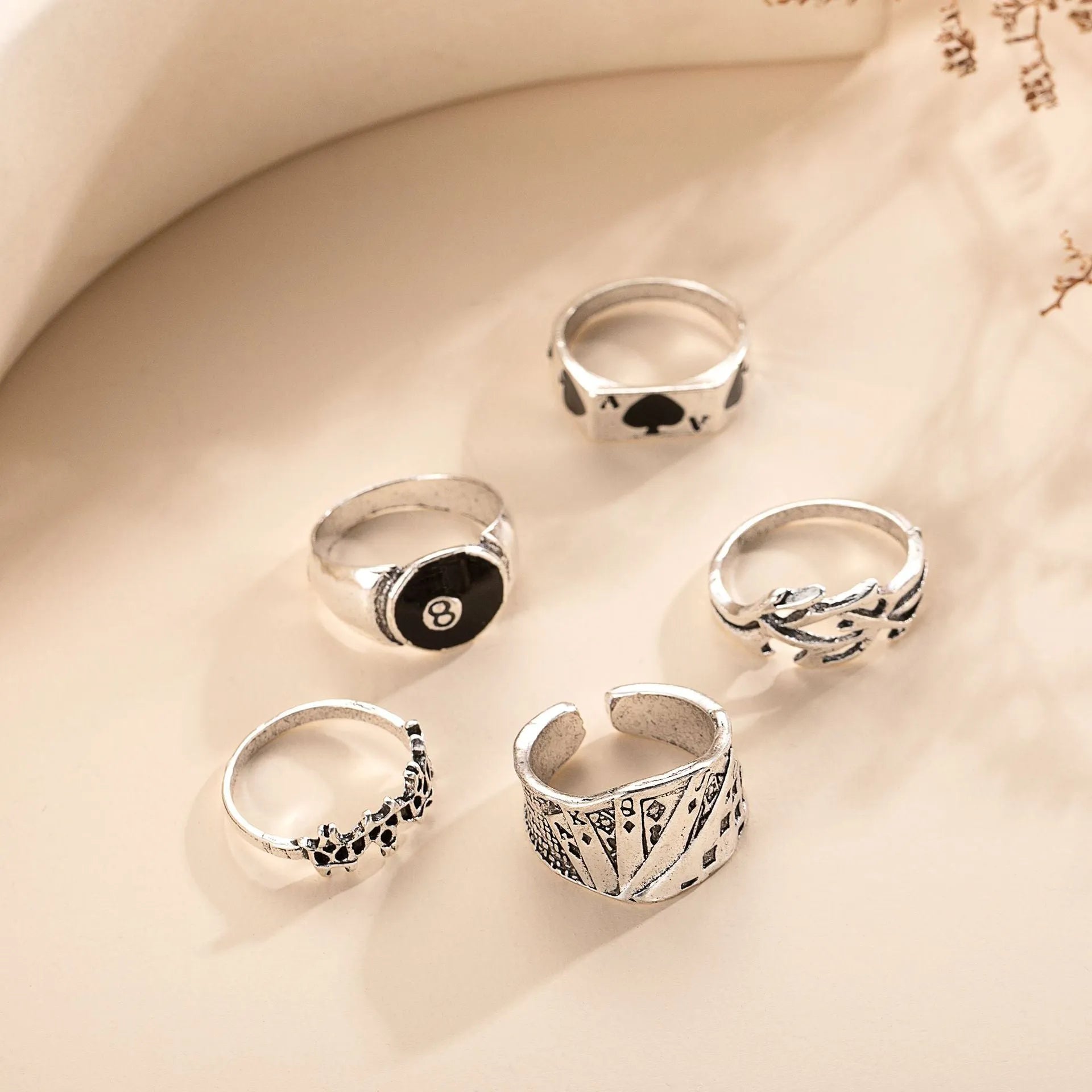 Black alloy ring with a raised retro spade card design on top.