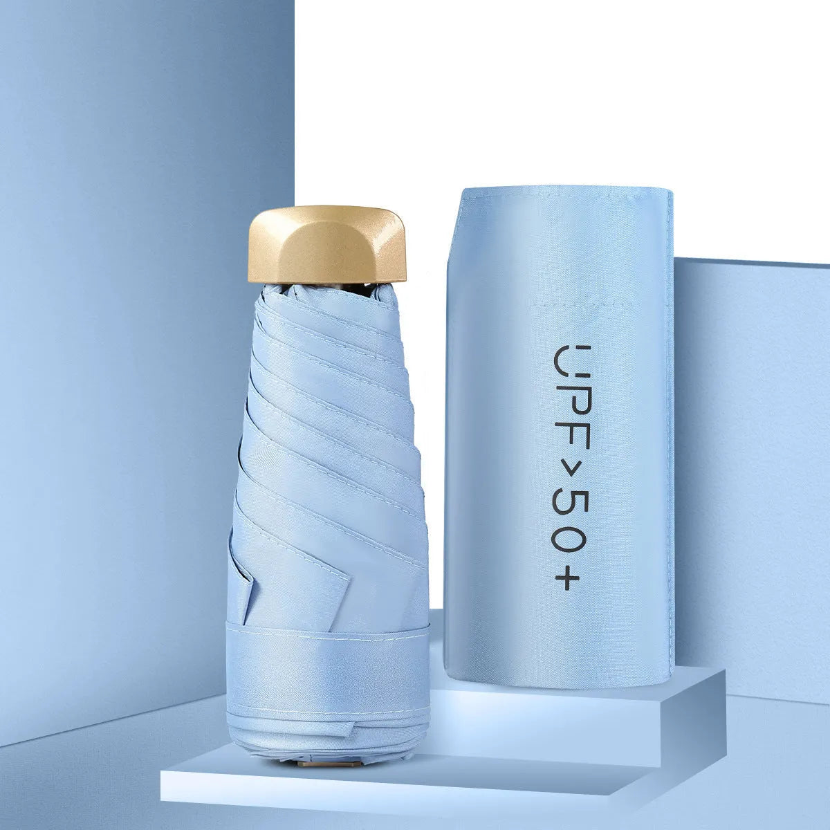 Five-fold mini pocket sun umbrella with rubber handle shown in open position