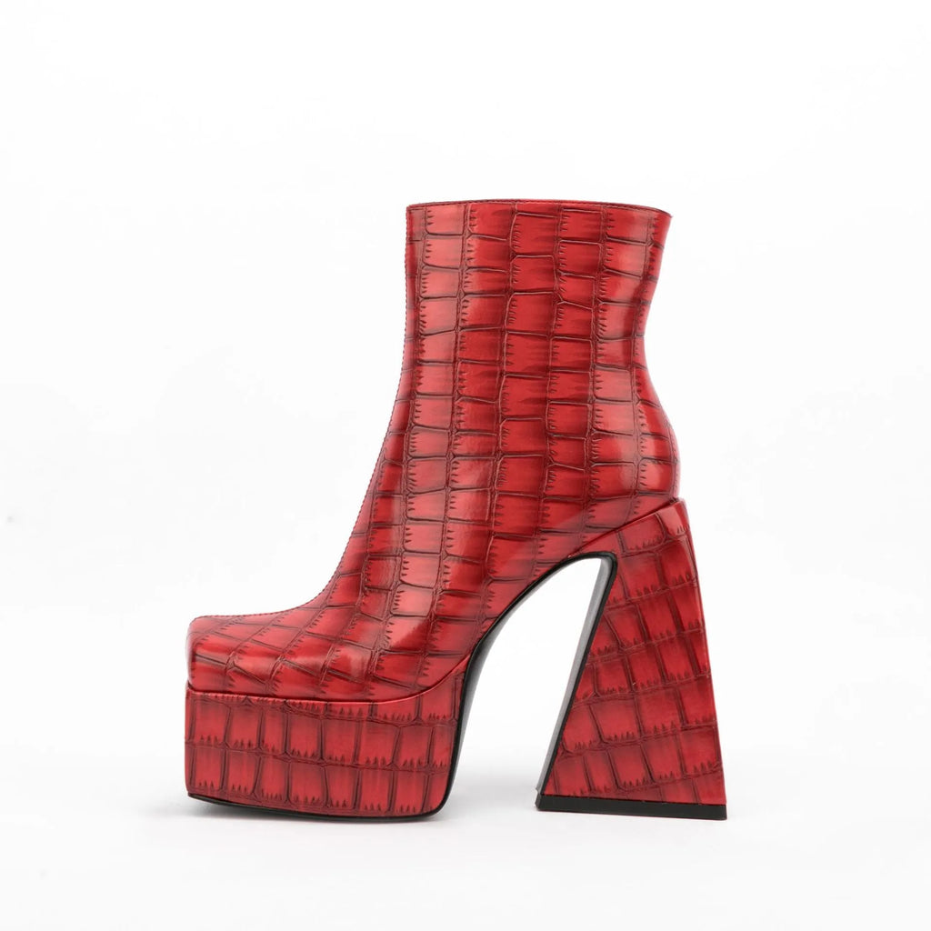 Women's solid-colour ankle boots with a high heel, shown in available shades.