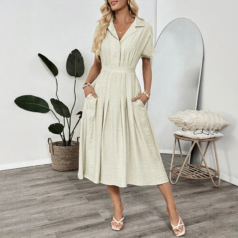 Light green women's twill shirt dress with lapel collar, waist tie, and a pocket.