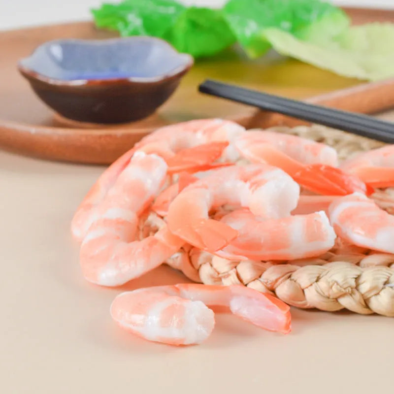 Modern minimalist PVC shrimp-shaped keychain with 1.5cm thickness.
