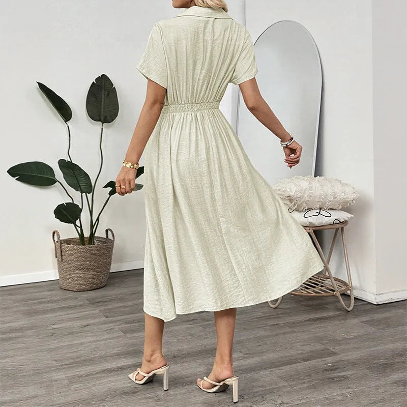 Light green women's twill shirt dress with lapel collar, waist tie, and a pocket.