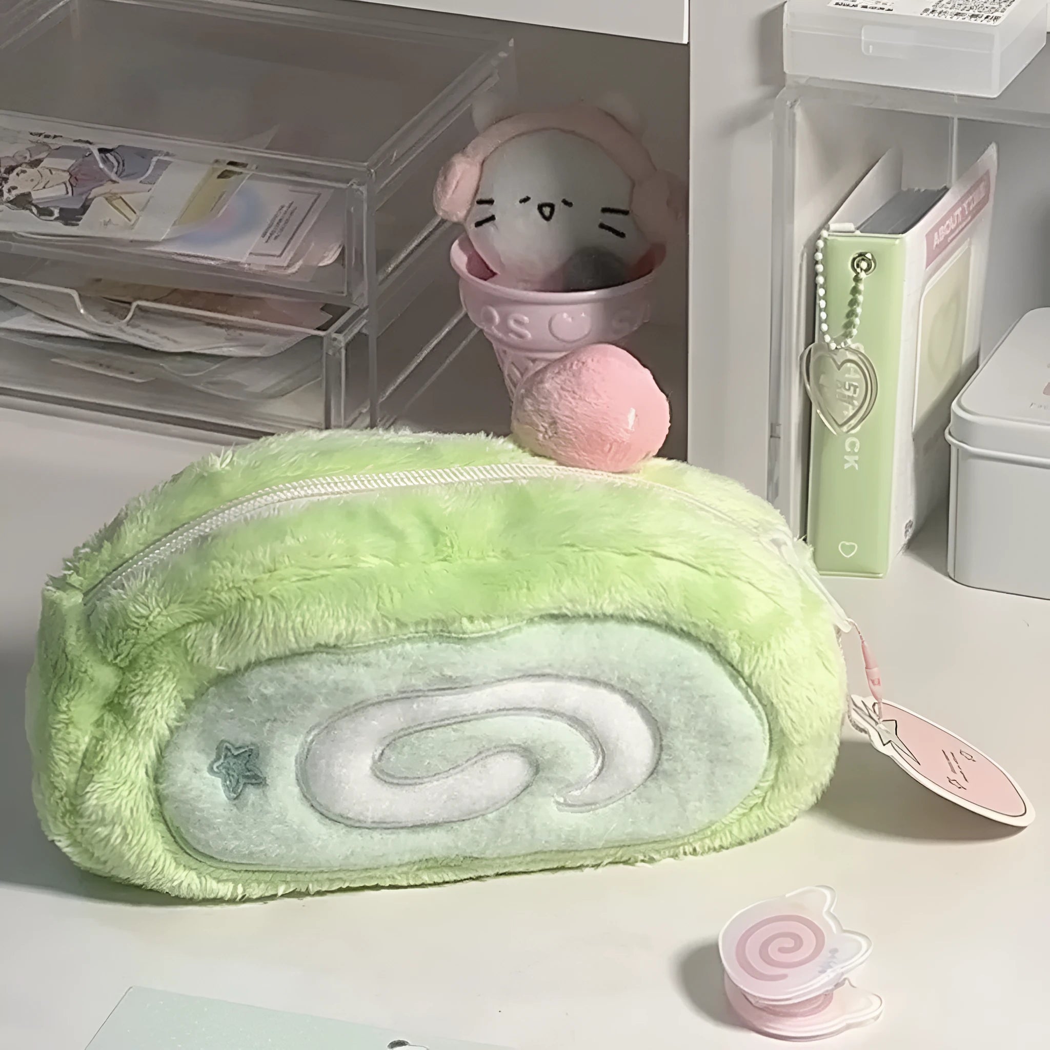 Grey and cream Swiss roll cake design velvet pencil case rolled up with pens visible