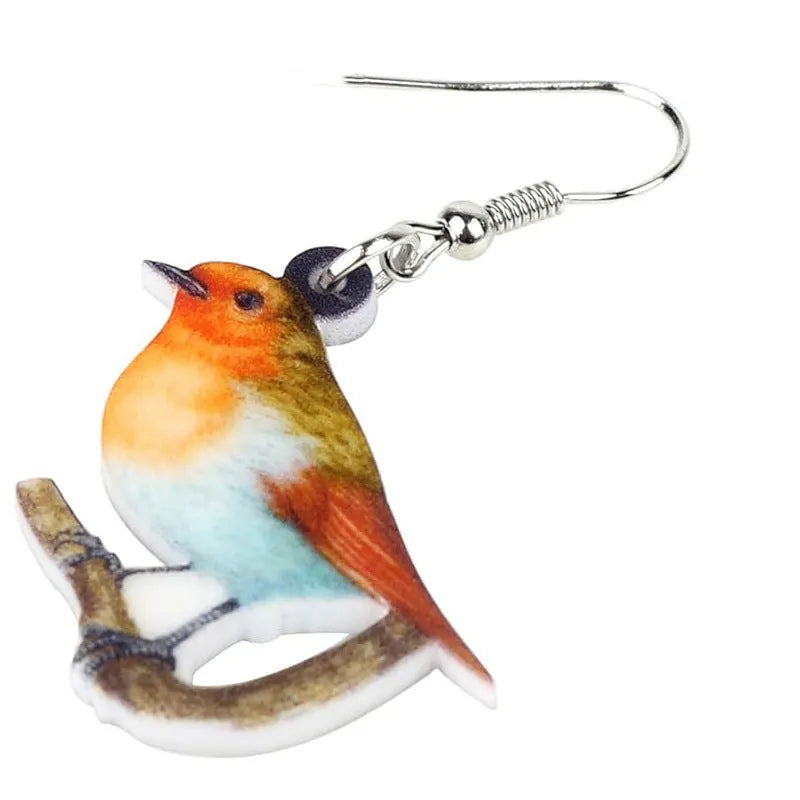 Blue titmouse pendant earrings with snake motifs on acrylic material