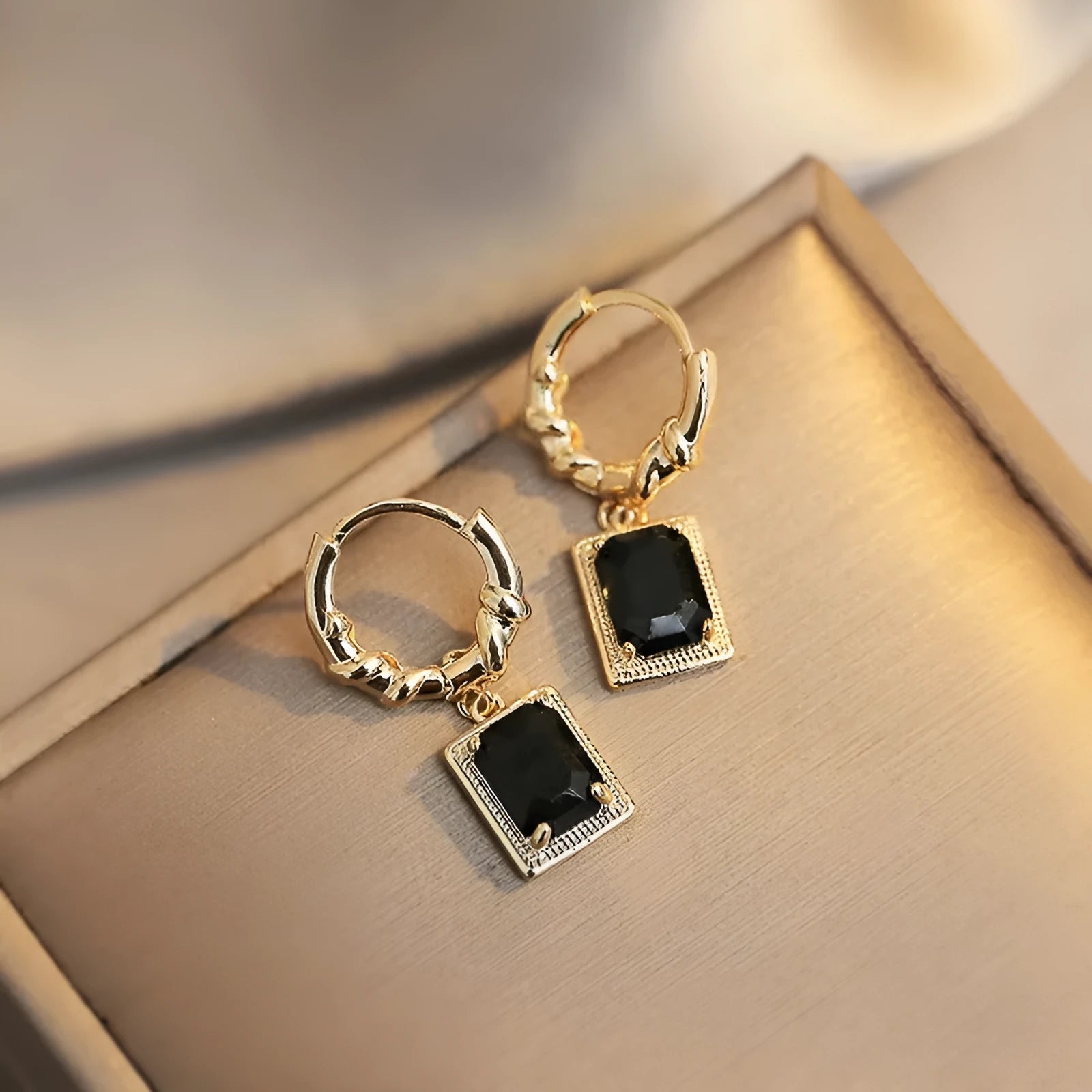 Black geometric quadrilateral zircon earrings with French court retro styling in copper construction