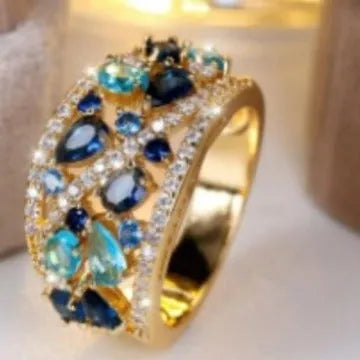 Women's round hollow copper fashion ring showing open design with metal plating and coloured accent options