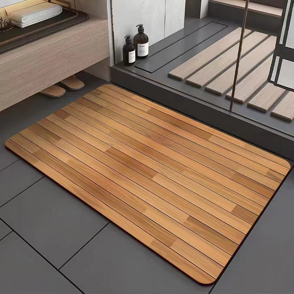 American-style square bath mat with wood grain pattern on a bathroom floor.