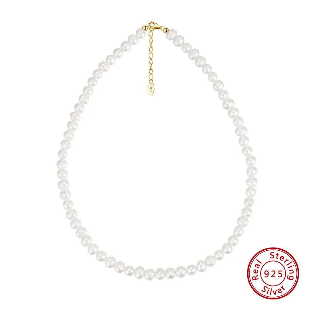 Women's freshwater pearl necklace with adjustable sterling silver chain showing 6-7mm natural pearls