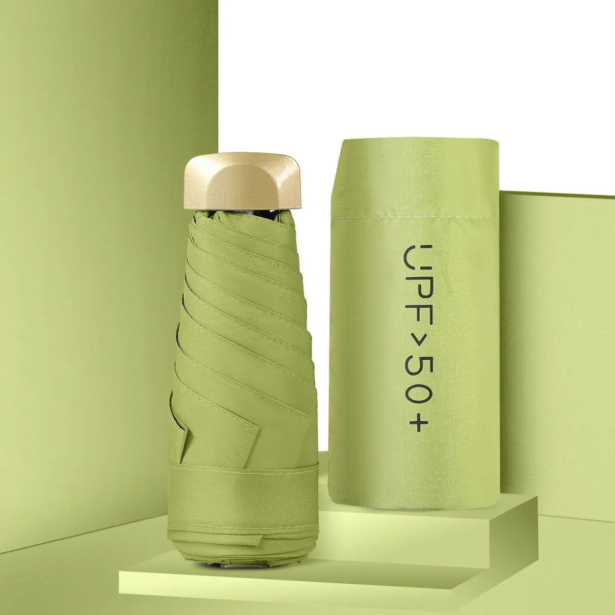 Five-fold mini pocket sun umbrella with rubber handle shown in open position