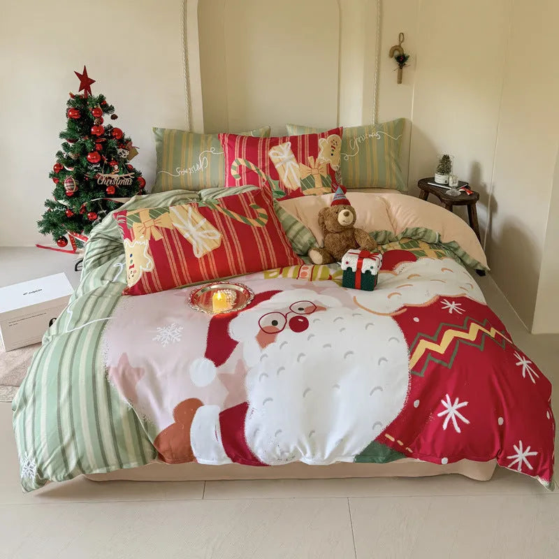 Christmas cartoon print bedding four-piece set showing sheet, duvet cover, and pillowcases.