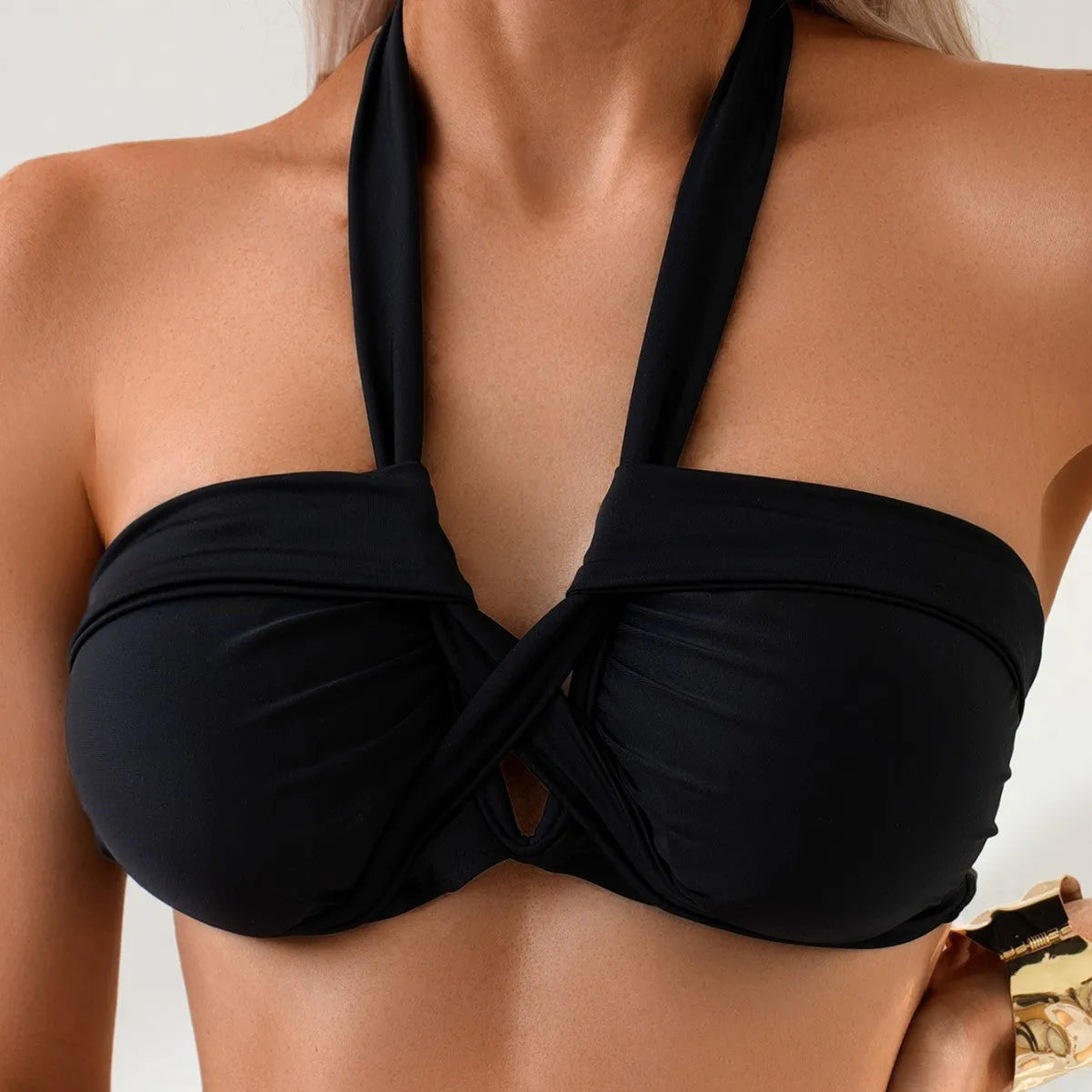 Black swimsuit bikini briefs with backless European styling and polyester construction