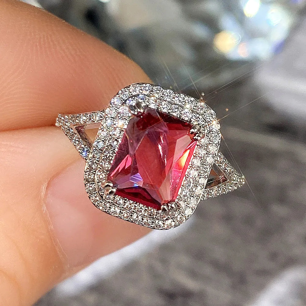 Copper square princess ring with red rhinestones, shown in size selection.