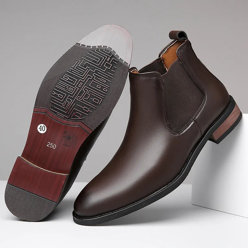 Men's black Chelsea boots with round toe, low heel, and mid-calf shaft made from artificial PU leather