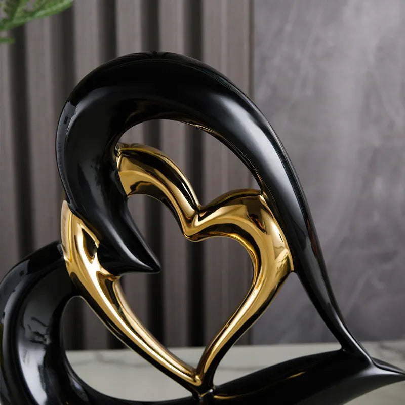 Modern white porcelain love heart ornament with geometric style on a table.