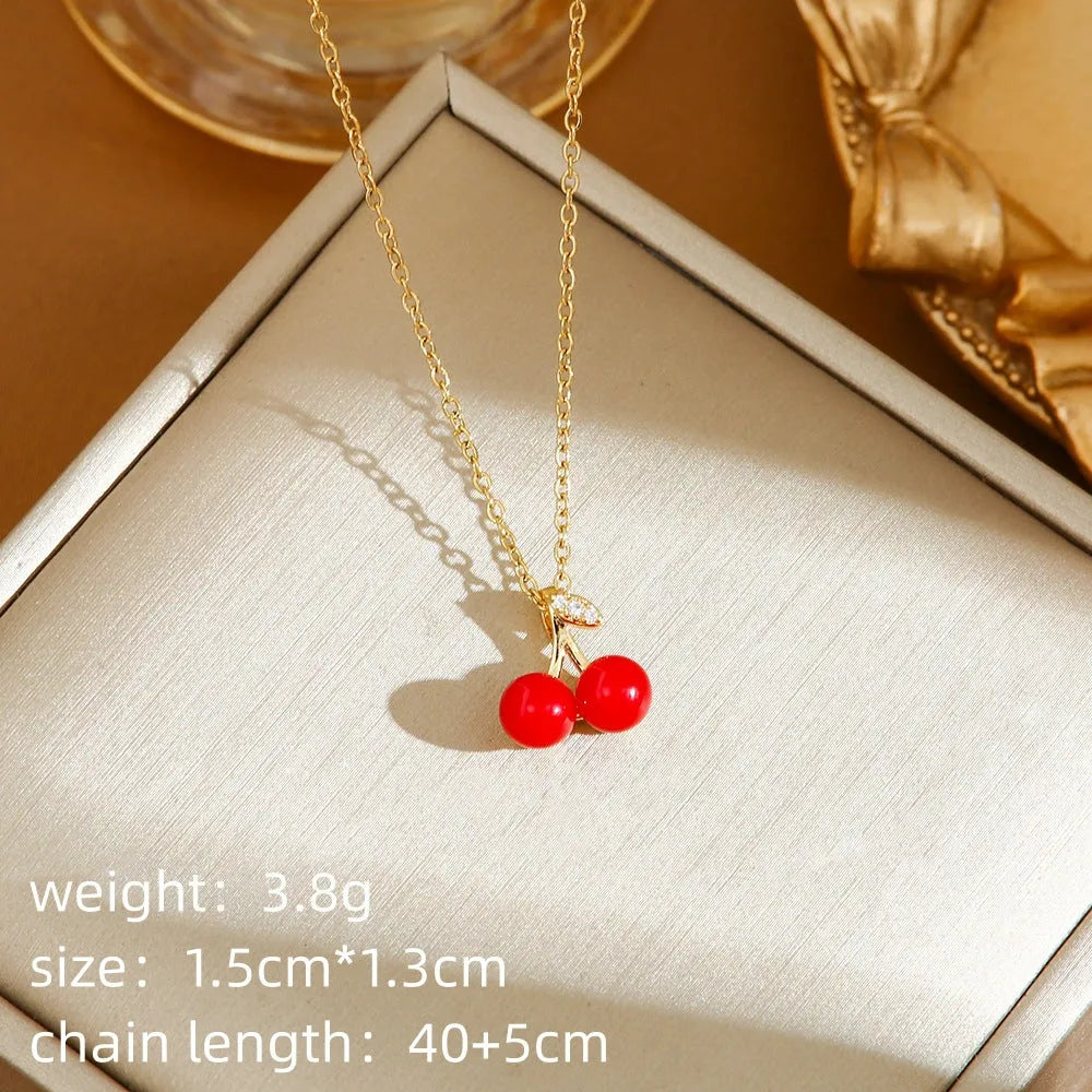 Titanium steel women's necklace with cherry, strawberry and pepper charms on O-ring chain