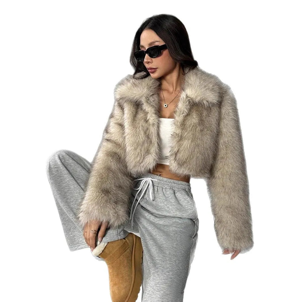 Artificial fur coat with fur collar in short 40cm length showing black tip on black colour variation