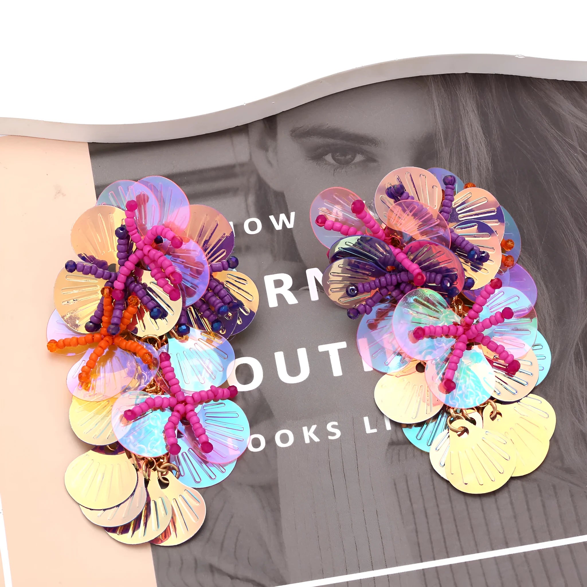 Handmade colourful string bead flower earrings with exaggerated floral leaf design in dopamine style.