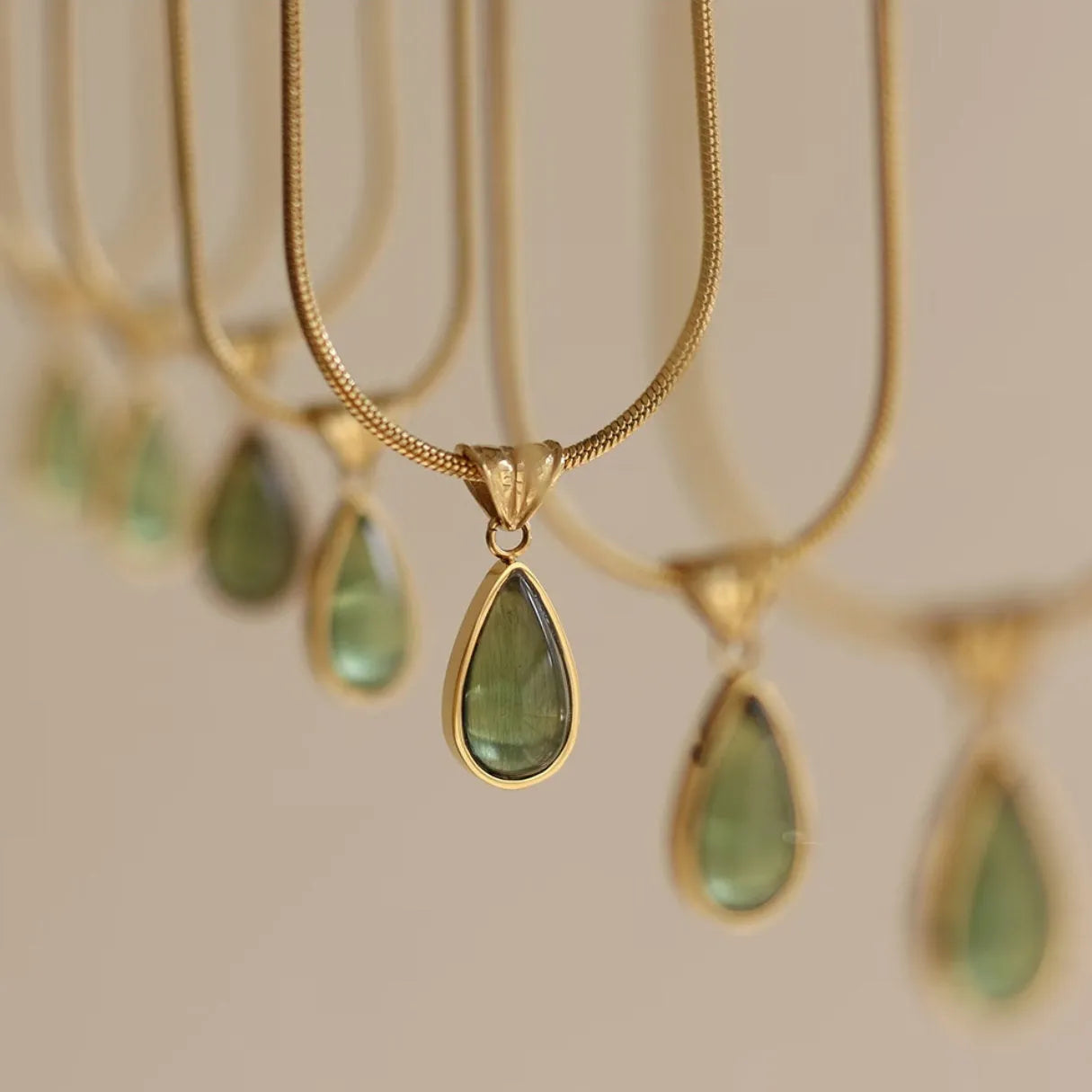 Retro blue and green water drop necklace with mixed gemstone inlays on titanium steel snake bone chain