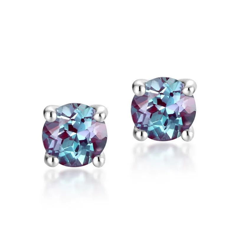 Geometric round silver ear studs with cultivated Alexandrite stone centre