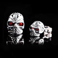 Retro skull stud earrings with red eye detailing and alloy artificial gemstone inlay