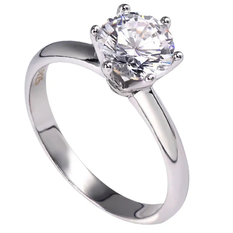 Six-claw inlaid zircon women's ring with geometric design in white gold plated finish