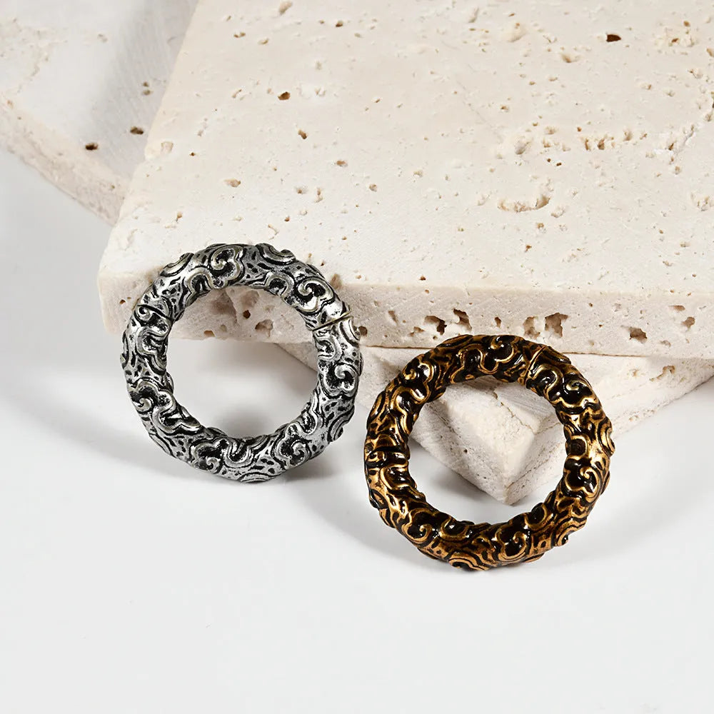 Fashion stainless steel totem pattern earrings showing electroplated colour options for OL style dressing