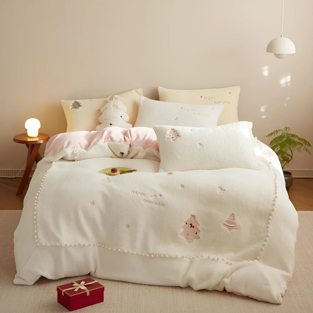 Milk fibre four-piece bedding set with green Christmas tree pattern showing fitted sheet, quilt cover and pillowcase