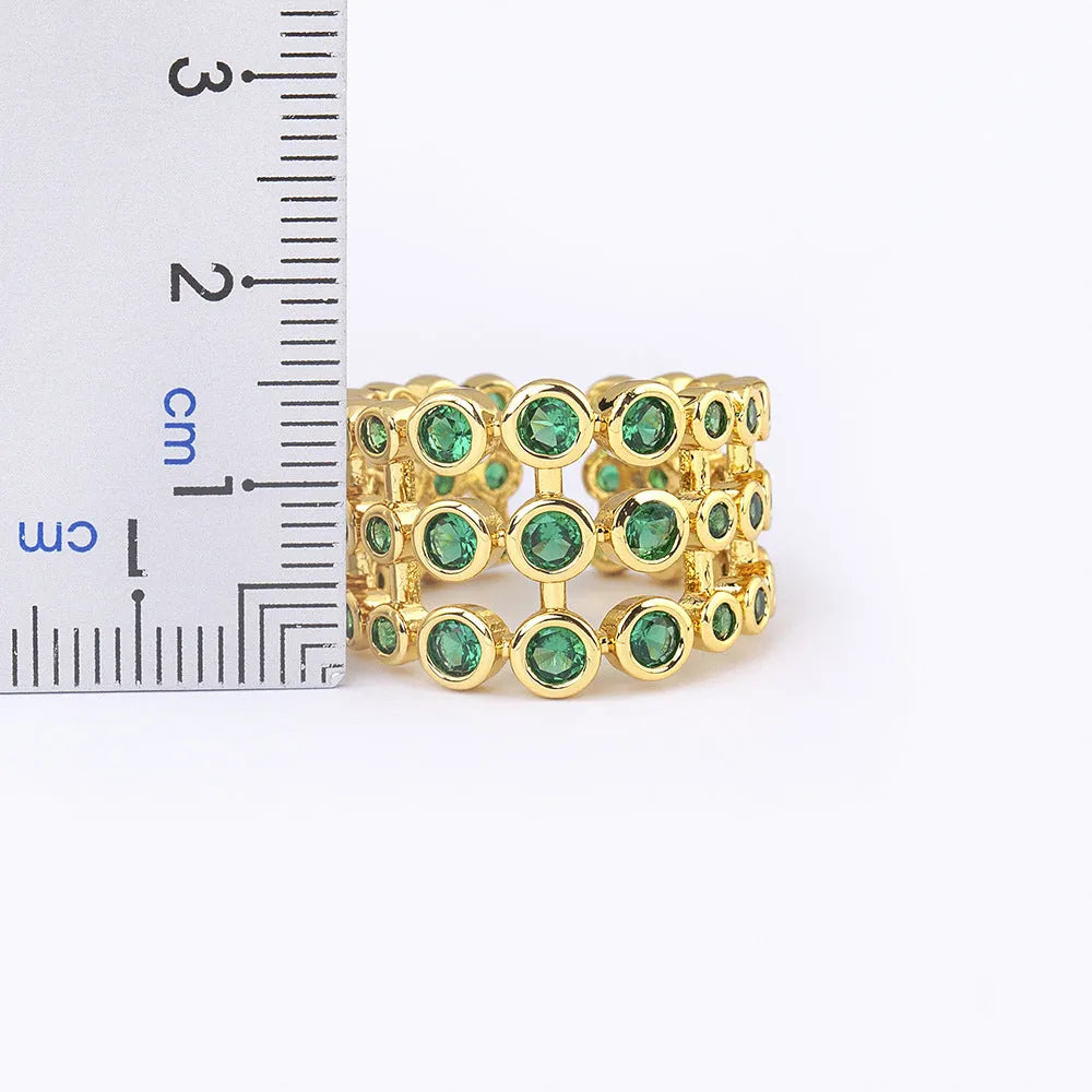 Copper 18K gold plated ring with three-layer green zircon setting in wide band design