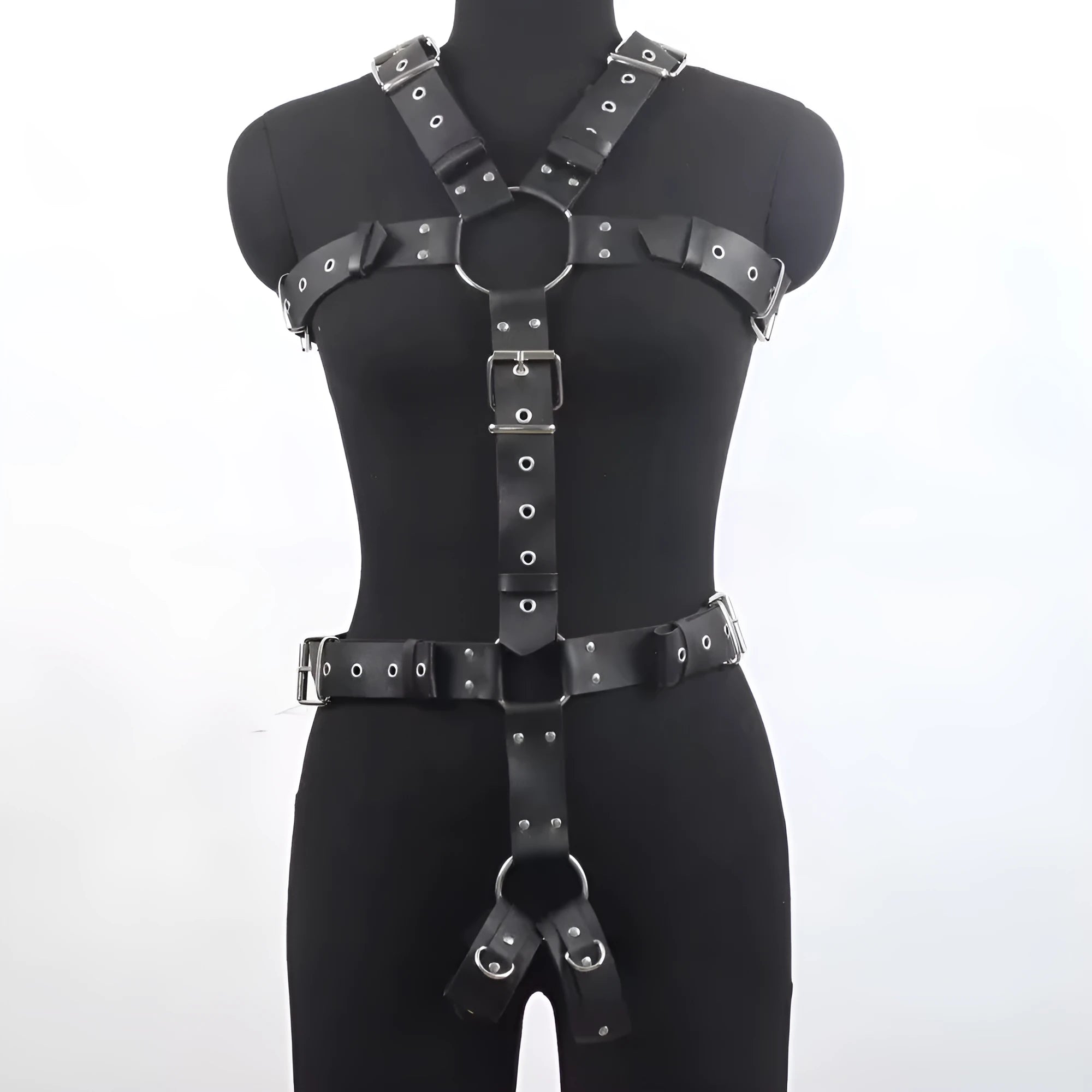 Thin black patent leather shapewear belt with a silver-tone pin buckle on a mannequin waist.