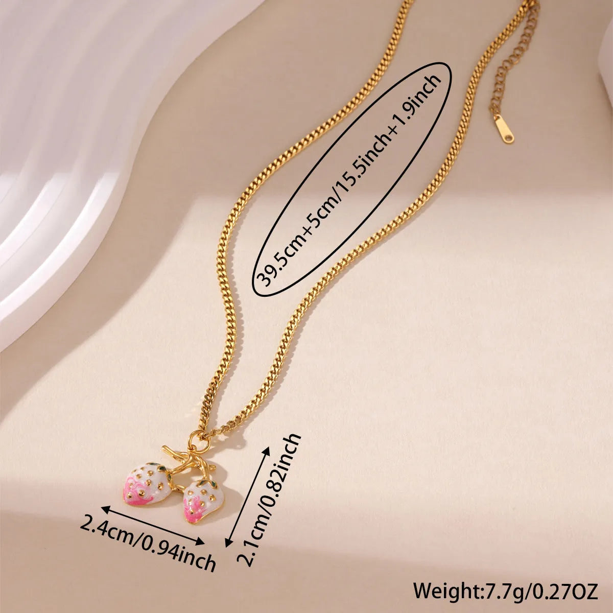 Stainless steel strawberry pendant necklace with red and white gradient colour finish.
