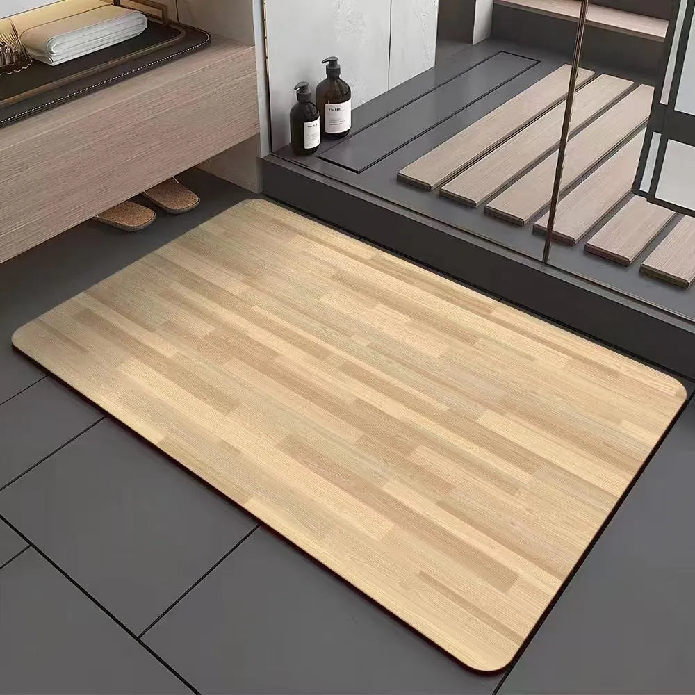 American-style square bath mat with wood grain pattern on a bathroom floor.